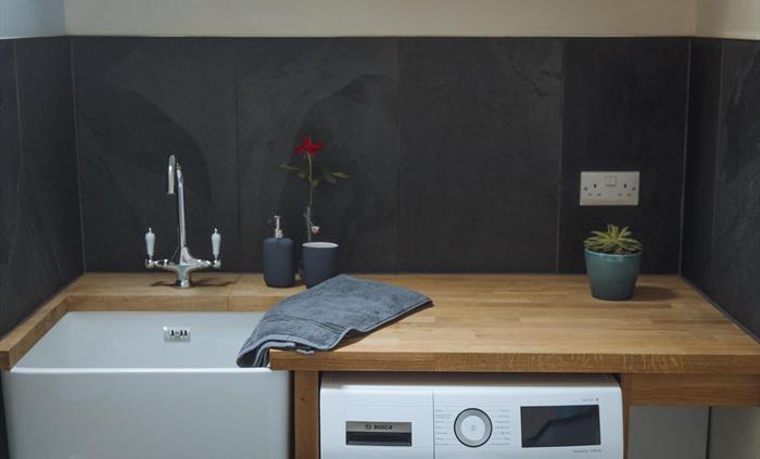 The ensuite/ laundry room